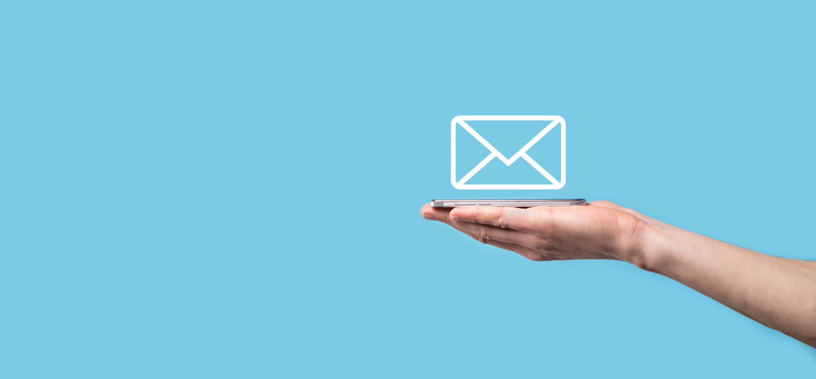 Male hand holding letter icon,email icons .Contact us by newsletter email and protect your personal information from spam mail. Customer service call center contact us.Email marketing and newsletter